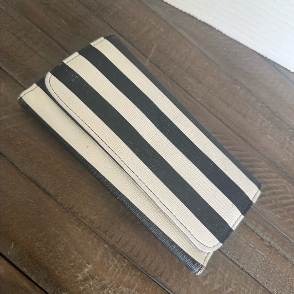 Kut from the Kloth  black and white striped wallet clutch bag.
